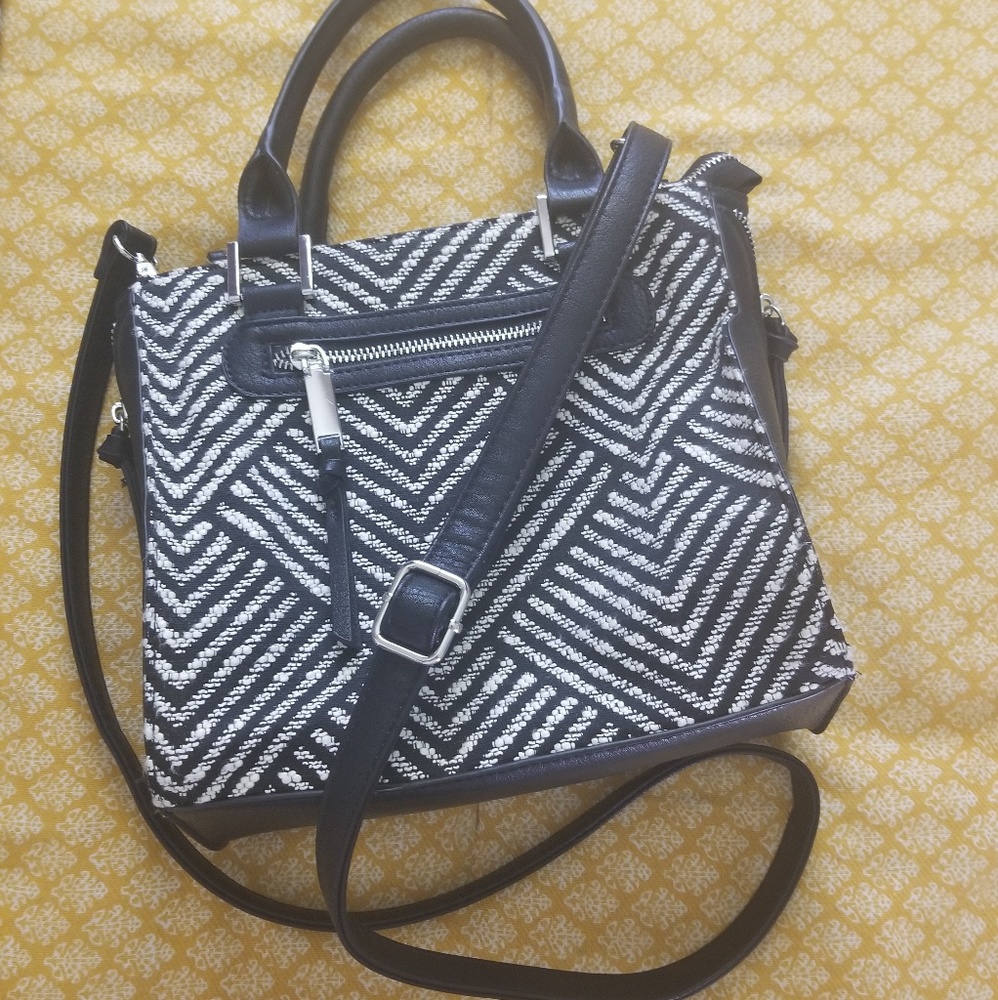 Torrid handbag with cross body strap